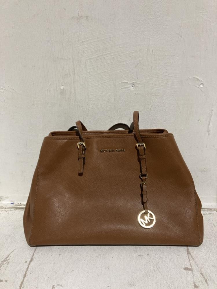 Lot 74  
            Birmingham SR107 - Parcel Delivery Only 

                
MICHAEL KORS BROWN LEATHER HANDBAG ORIGINAL RRP £187