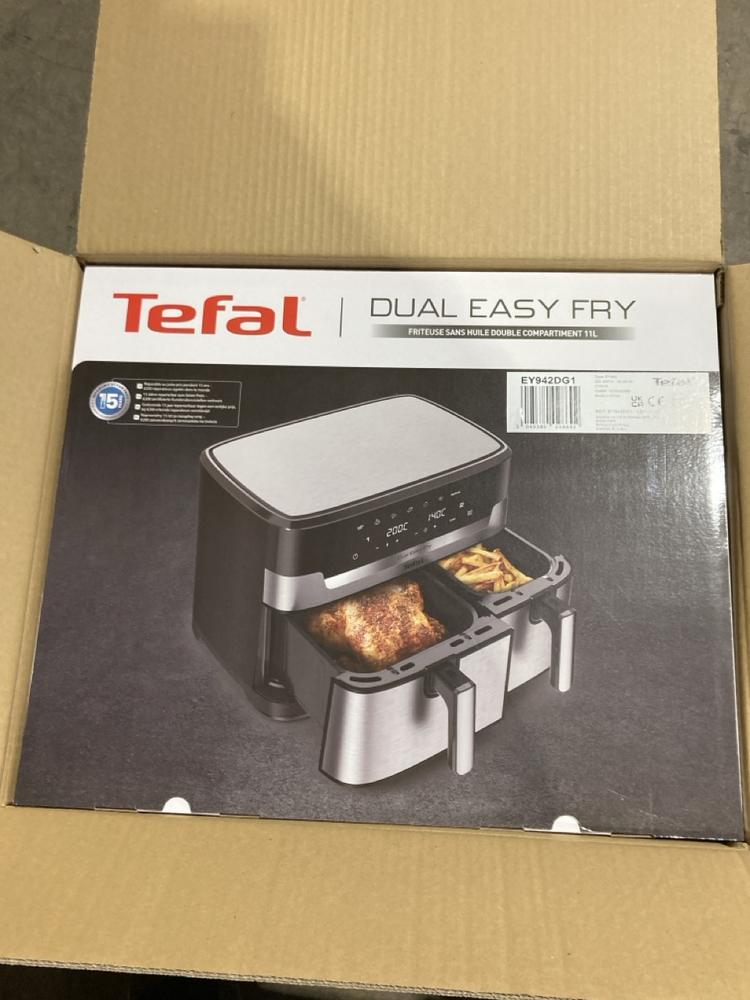 Lot 317  
            Birmingham SR106 - Collection or Optional Delivery Available 

                
TEFAL EASY FRY XXL AIR FRYER ORIGINAL RRP £199 - EY942DG1 - (LOCATION: RACKINGS)