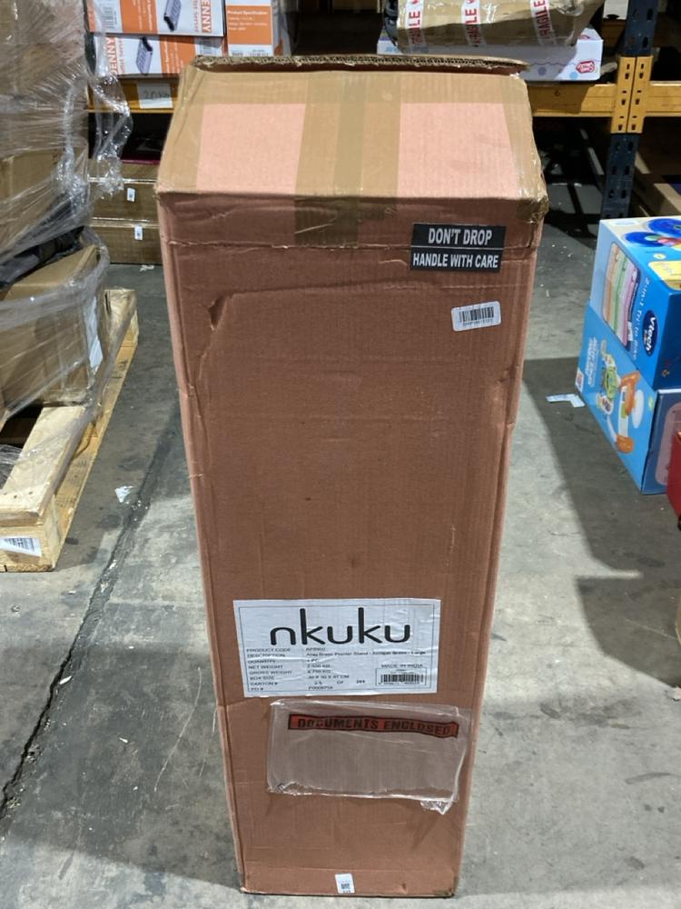 Lot 335  
            Birmingham SR106 - Collection or Optional Delivery Available 

                
NKUKU ATSU BRASS INDOOR PLANTER & STAND ORIGINAL RRP £130 (LOCATION: RACKINGS)