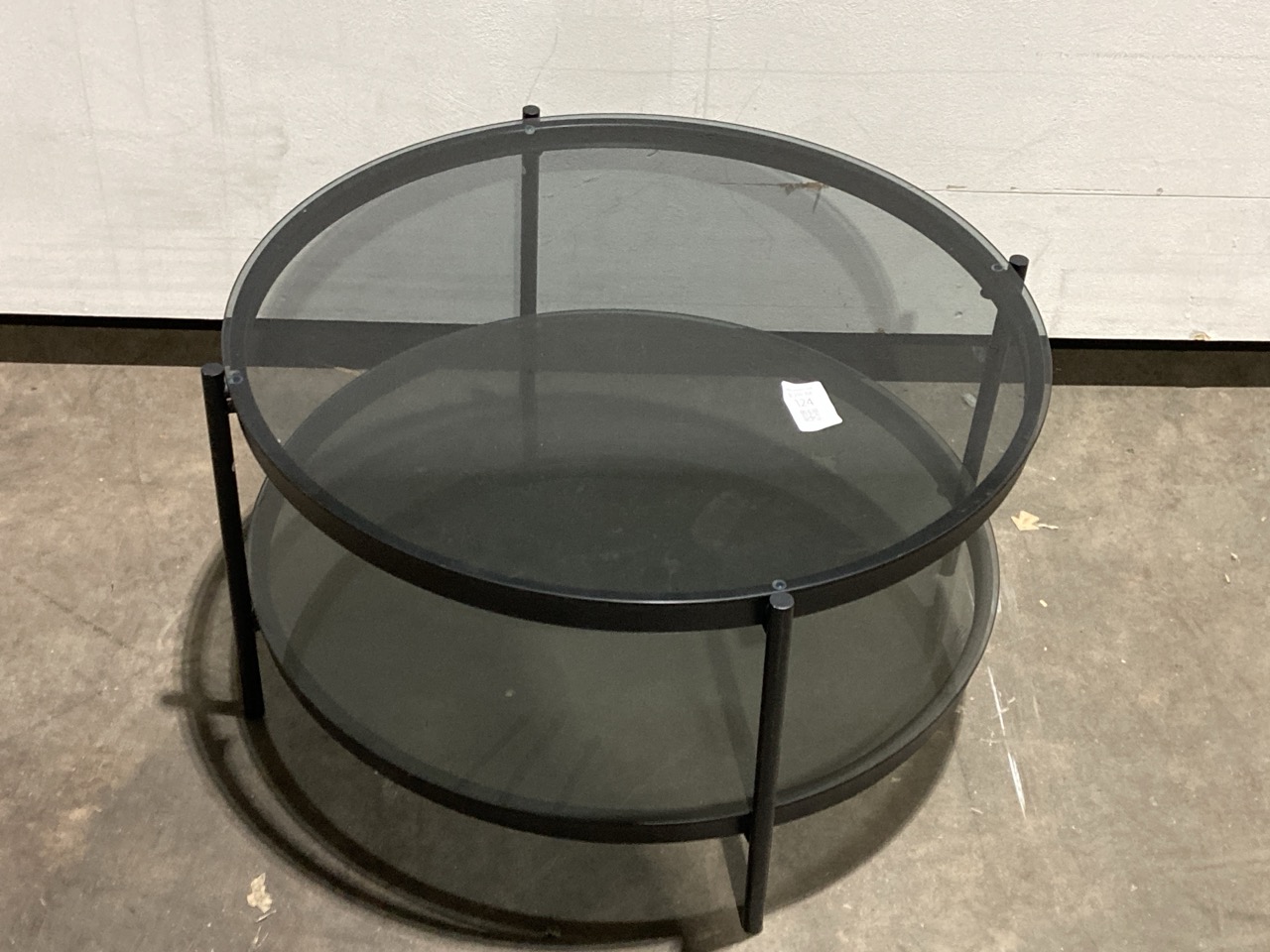 Lot 124  
            Birmingham - Collection Only 

                
DAVID PHILLIPS DAVIS ROUND COFFEE TABLE IN BLACK/ GLASS IN-30404D ORIGINAL RRP £159