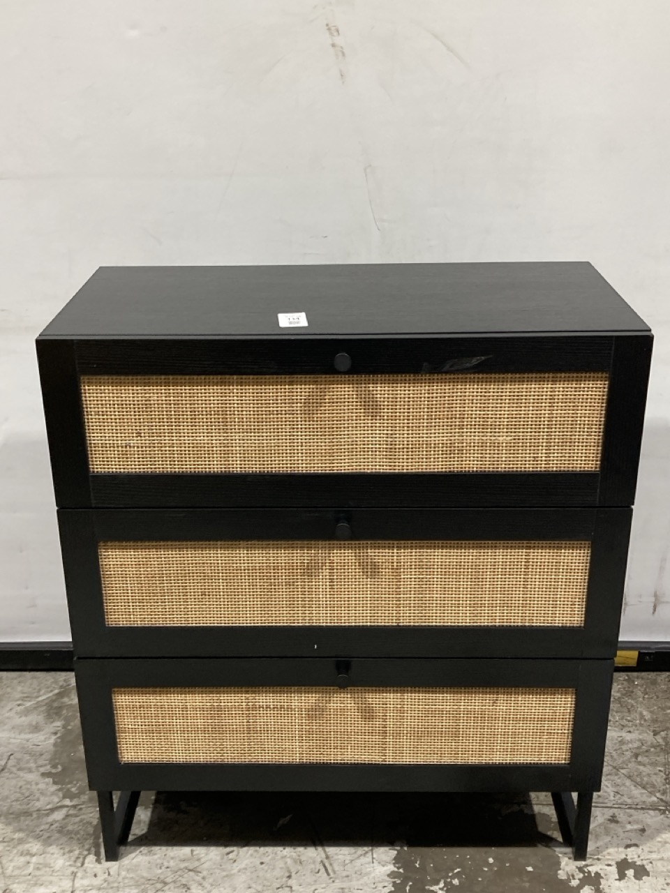 Lot 134  
            Birmingham - Collection or Delivery 

                
DAVID PHILLIPS R/LYDIA 3DRW CHEST IN RATTAN/BLACK IR-39170D ORIGINAL RRP £249