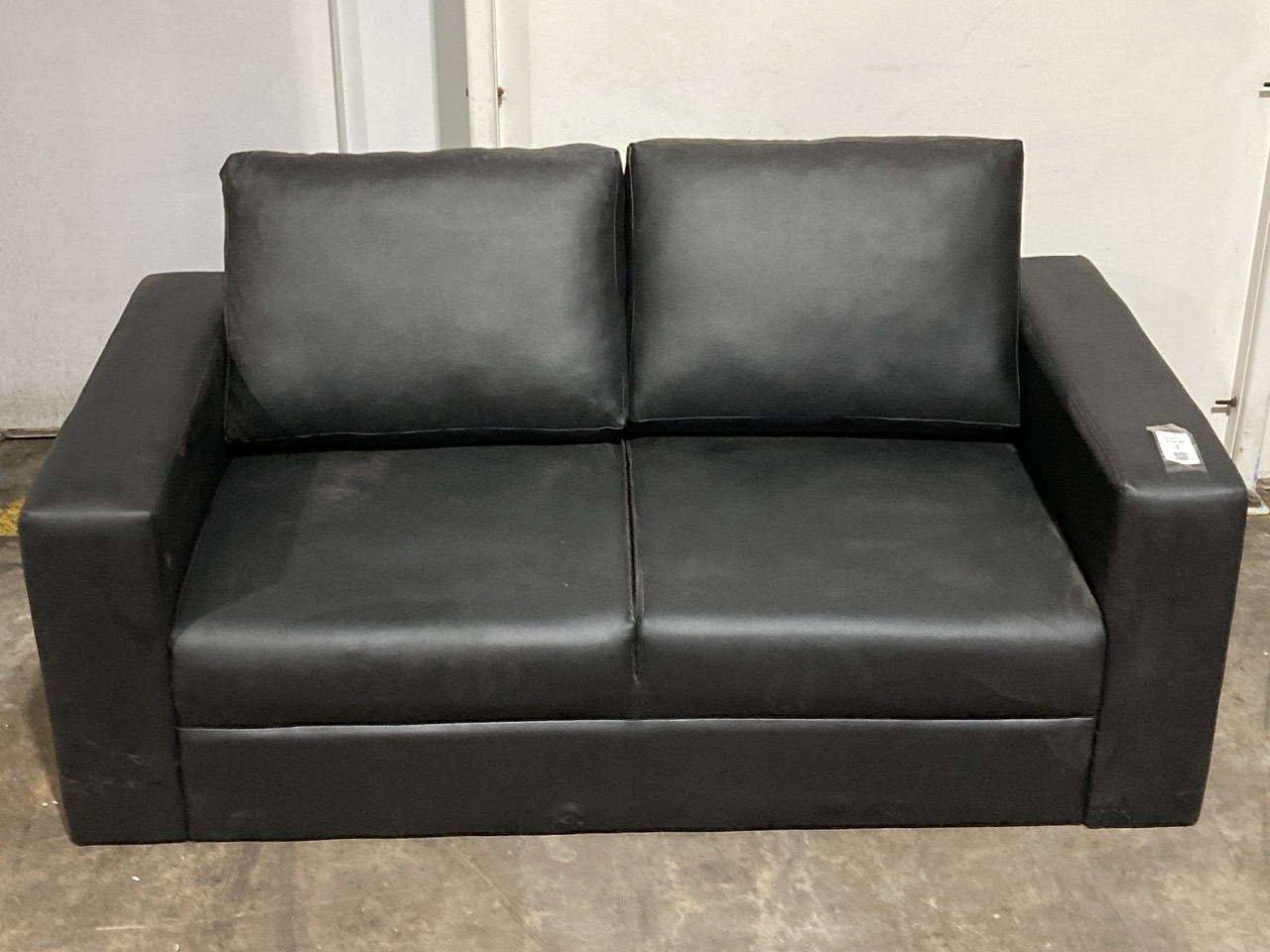 Lot 1  
            Birmingham - Collection or Delivery 

                
DAVID PHILLIPS FAUX LEATHER 2 SEATER SOFA IN BLACK