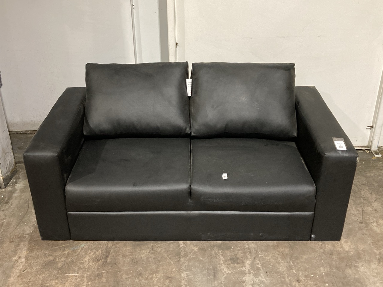 Lot 2  
            Birmingham - Collection or Delivery 

                
DAVID PHILLIPS FAUX LEATHER 2 SEATER SOFA IN BLACK