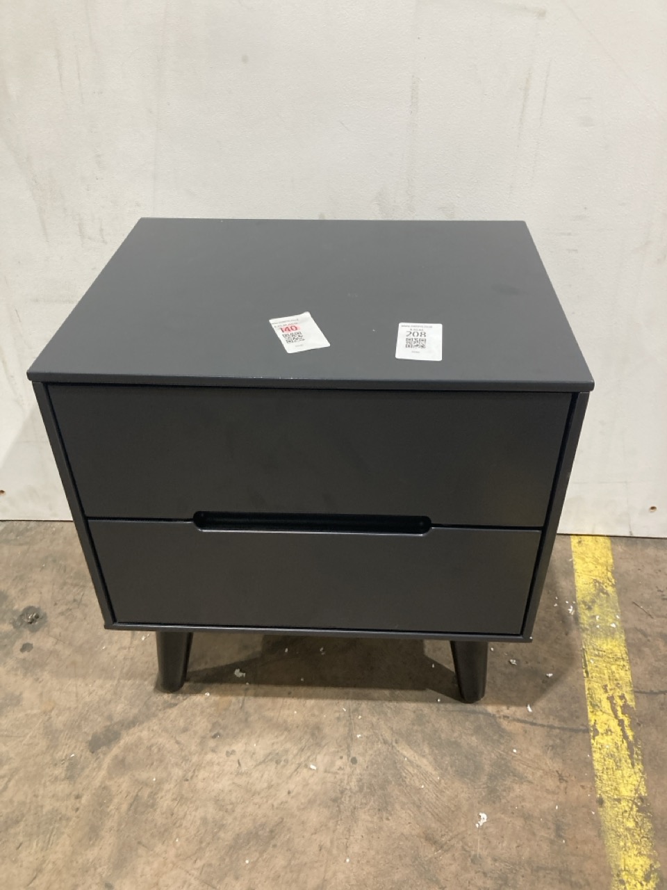 Lot 208  
            Birmingham - Collection or Delivery 

                
DAVID PHILLIPS 2DRW BEDSIDE TABLE IN BLACK ORIGINAL RRP £150