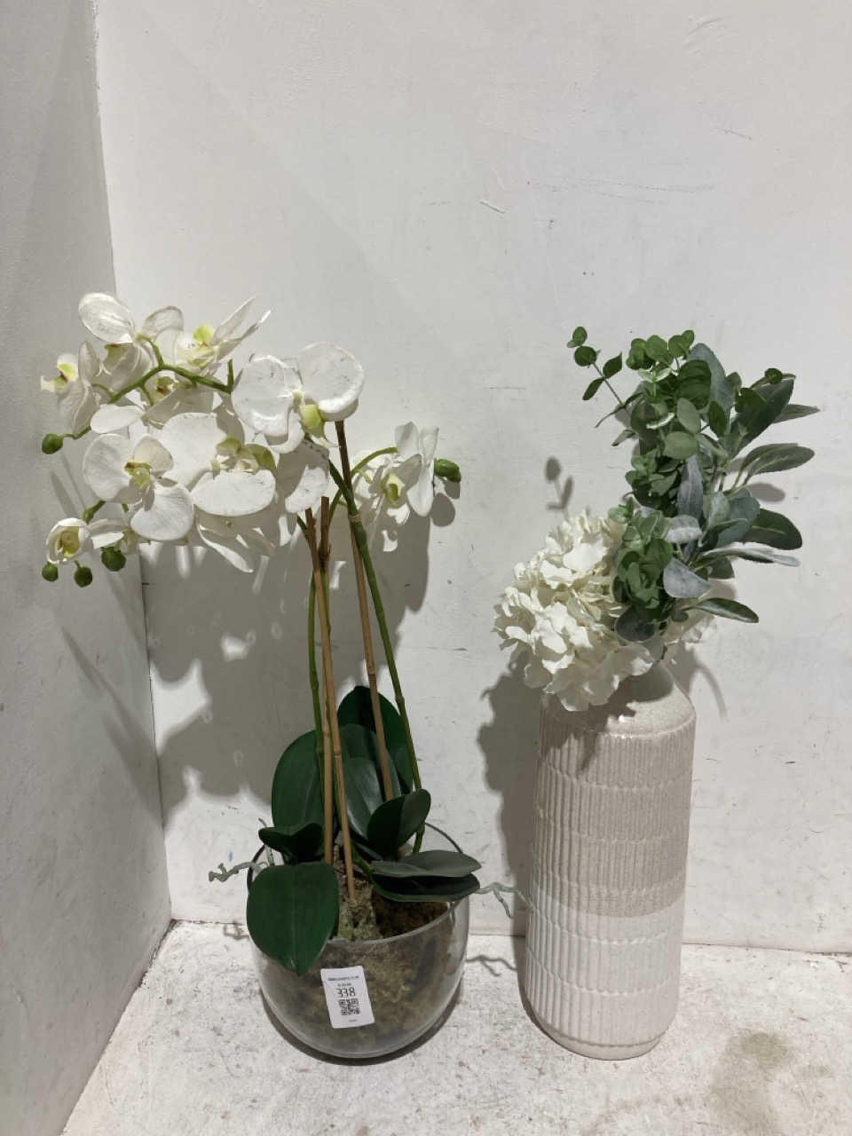 Lot 338  
            Birmingham - Collection Only 

                
DAVID PHILLIPS PAIR OF DECORATIVE PLANTS TO INCLUDE LARGE ORCHID