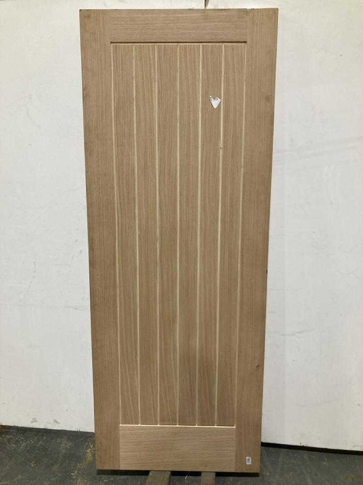 Lot 424  
            Chesterfield SR40 - Collection or Optional Delivery Available 

                
UNFINISHED OAK SUFFOLK ESSENTIAL INTERNAL DOOR 1981 X 762MM (LOCATION: B RACKING)