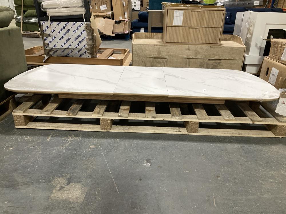 Lot 510  
            Chesterfield SR40 - Collection or Optional Delivery Available 

                
MARBLE EFFECT WOODEN EXTENDABLE TABLE IN WHITE (LOCATION: B6)
