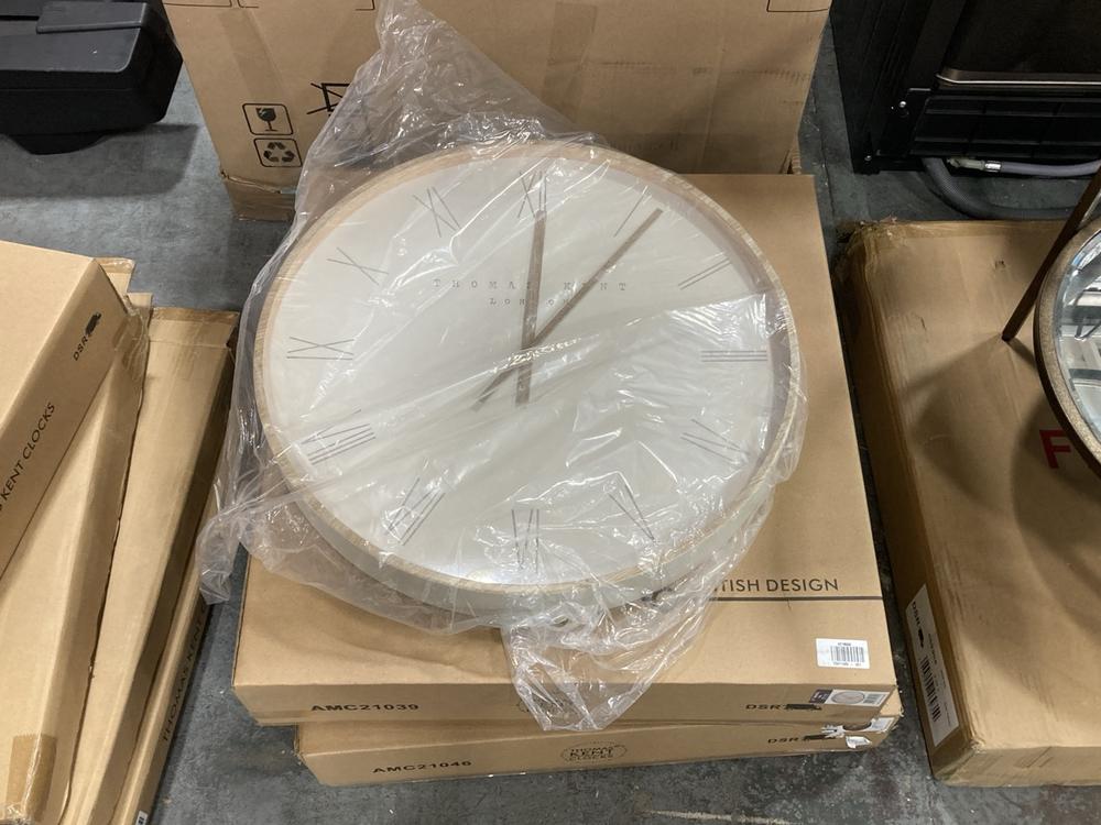 Lot 182  
            Chesterfield SR36 - Collection or Optional Delivery Available 

                
21 INCH NORDIC CLOCK IN TOFU TO INCLUDE 21 INCH FLORENTINE CLOCK (LOCATION: SR36 A4)