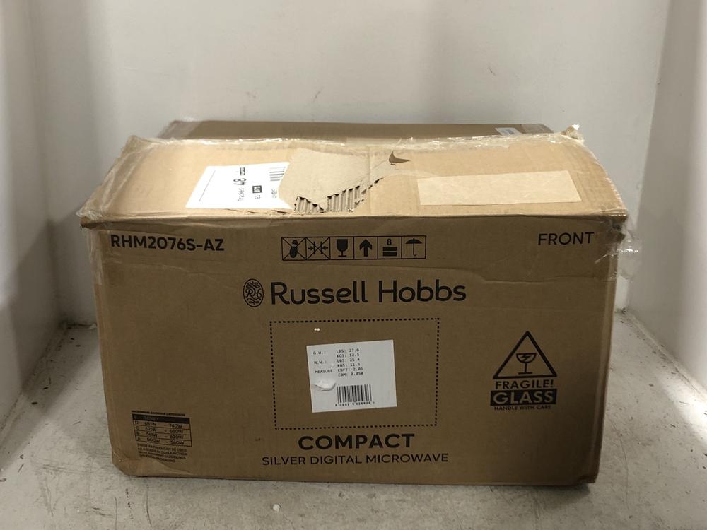 Lot 153  
            Chesterfield SR45 - Parcel Delivery Only 

                
RUSSELL HOBBS COMPACT SILVER DIGITAL MICROWAVE RHM2076S-AZ (LOCATION: G4)