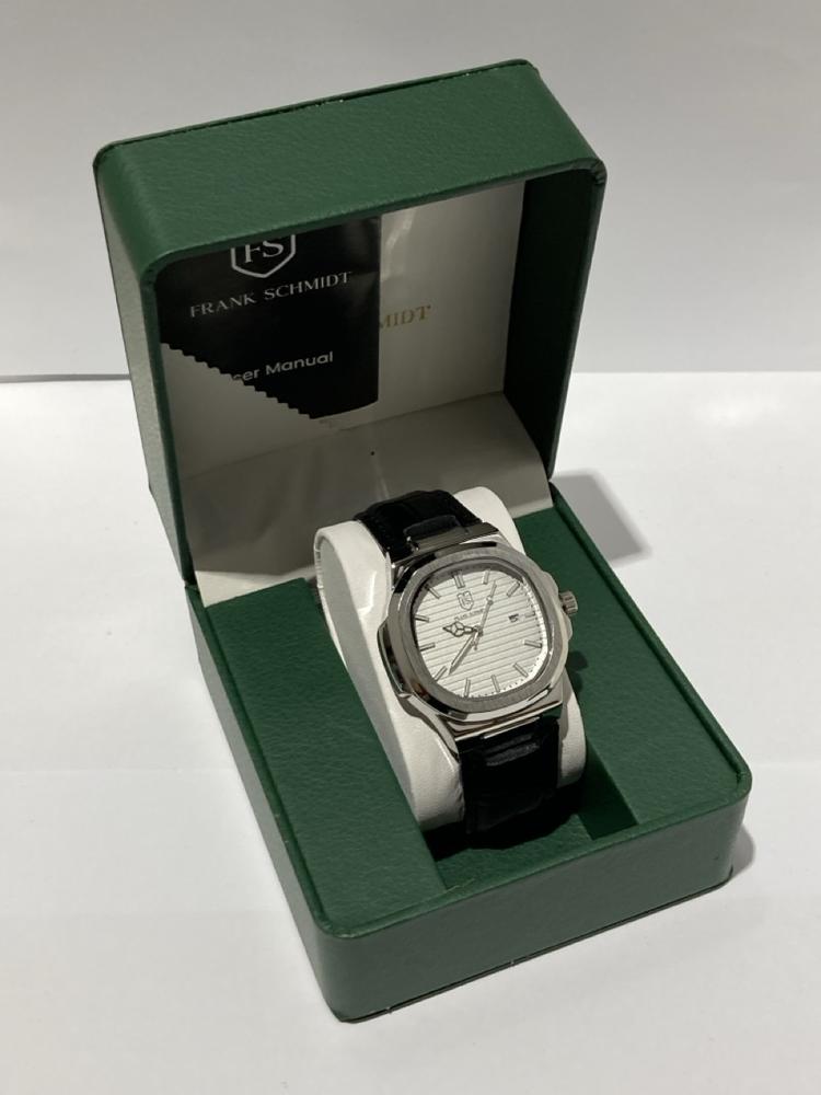 Lot 115  
            Chesterfield SR44 - Parcel Delivery Only 

                
MENS FRANK SCHMIDT WATCH – TEXTURED DIAL WITH DATE – LEATHER STRAP- MODEL: FSL AM...
