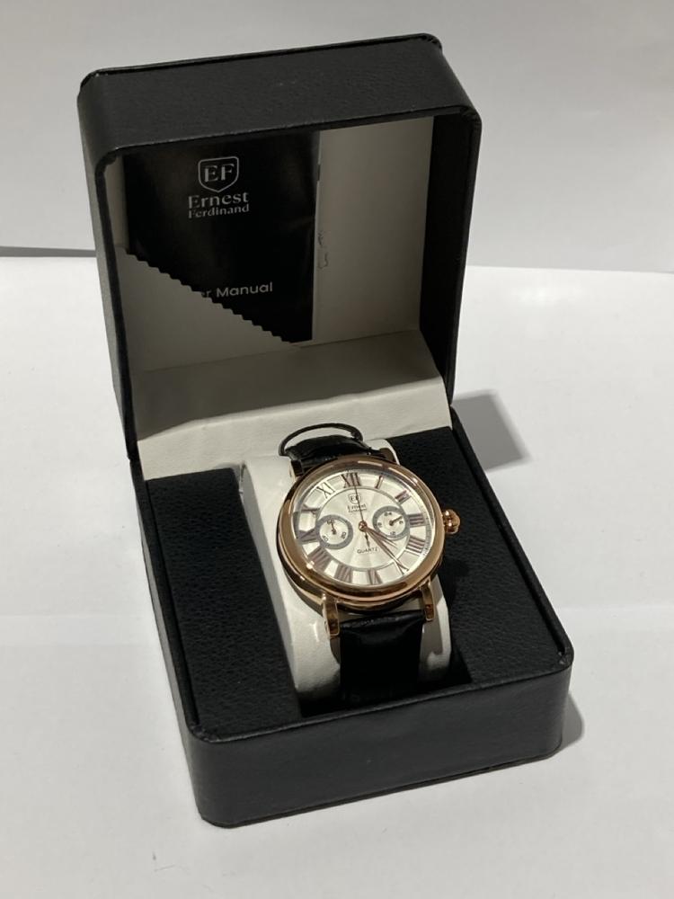 Lot 122  
            Chesterfield SR44 - Parcel Delivery Only 

                
MENS ERNEST FERDINAND WATCH – FUNCTIONING SUBDIALS – LEATHER STRAP – GLASS EXHIBI...