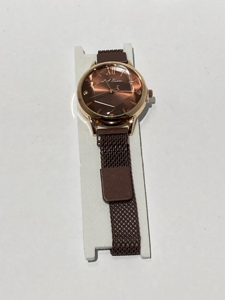 Lot 129  
            Chesterfield SR44 - Parcel Delivery Only 

                
LADIES LA BANUS WRIST WATCH IN BROWN WITH BROWN DIAL (LOCATION: L11)