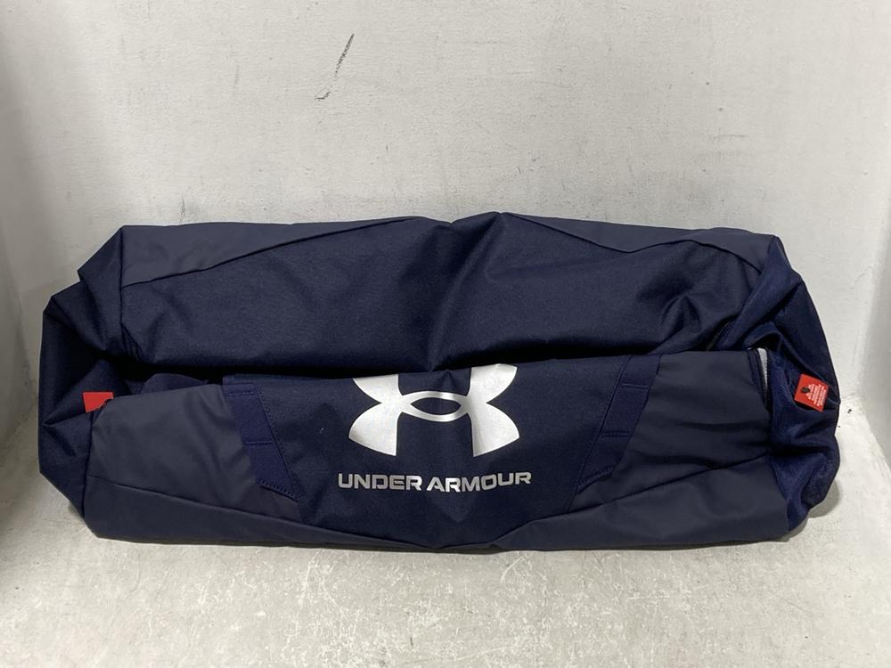 Lot 269  
            Chesterfield SR44 - Parcel Delivery Only 

                
BOX OF ASSORTED BAGS TO INCLUDE UNDER ARMOUR DUFFLE BAG IN NAVY 58L (LOCATION: G3)