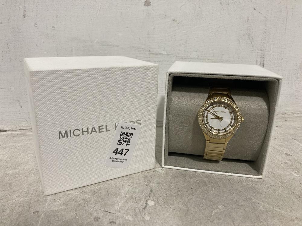 Lot 447  
            Chesterfield SR44 - Parcel Delivery Only 

                
MICHAEL KORS SYLVIA MINI THREE-HAND GOLD TONE LADIES WATCH (LOCATION: H1)