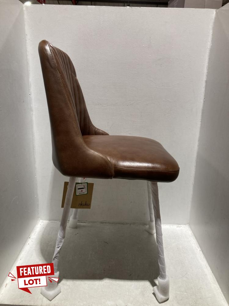 Lot 58  
            Chesterfield SR44 - Parcel Delivery Only 

                
NKUKU HARSHA LEATHER DINING CHAIR - ITEM NO. HC1601 - ORIGINAL RRP £350 (LOCATION...