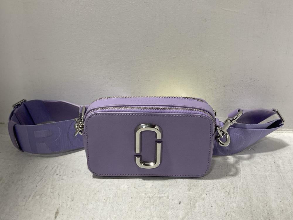 Lot 520  
            Chesterfield SR47 - Parcel Delivery Only 

                
MARC JACOBS THE SNAPSHOT DTM CROSS-BODY BAG IN LILAC ORIGINAL RRP £350.(9370007) ...