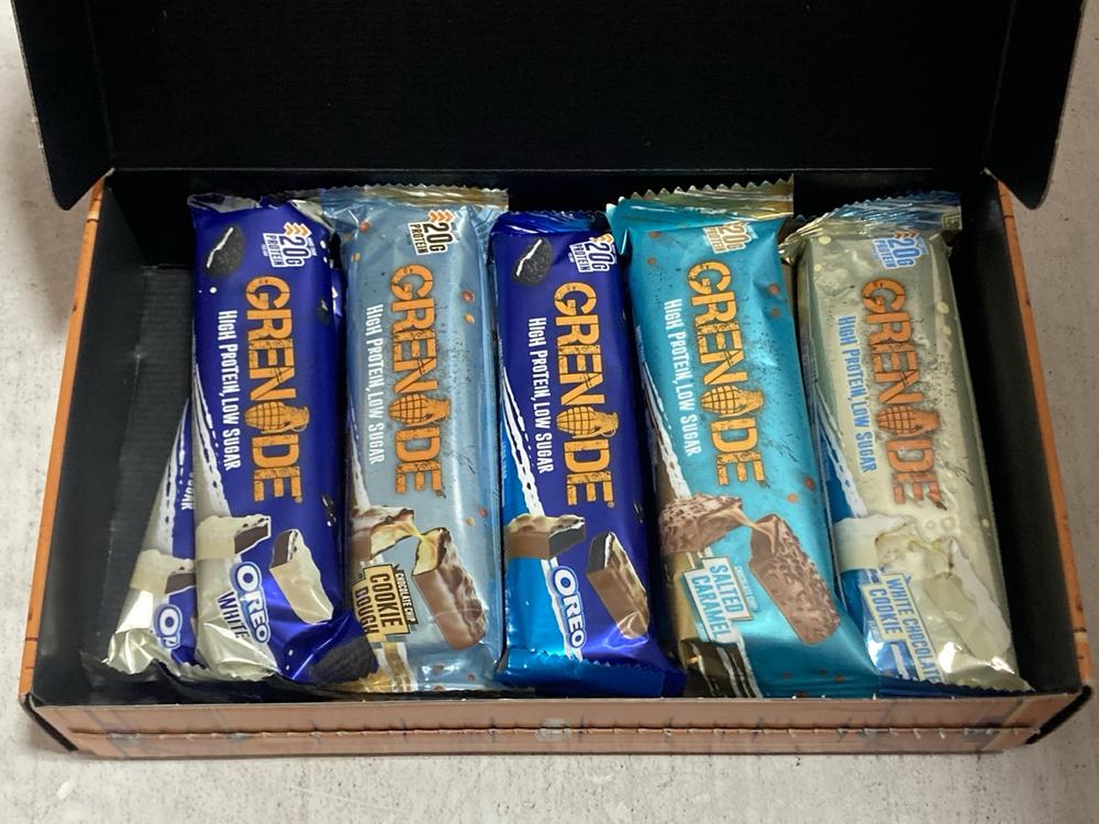 Lot 639  
            Chesterfield SR47 - Parcel Delivery Only 

                
6 X GRENADE FAN FAVOURITES SELECTION BOX (10 X 60G) - BB MAY HAVE EXPIRED TOTAL O...