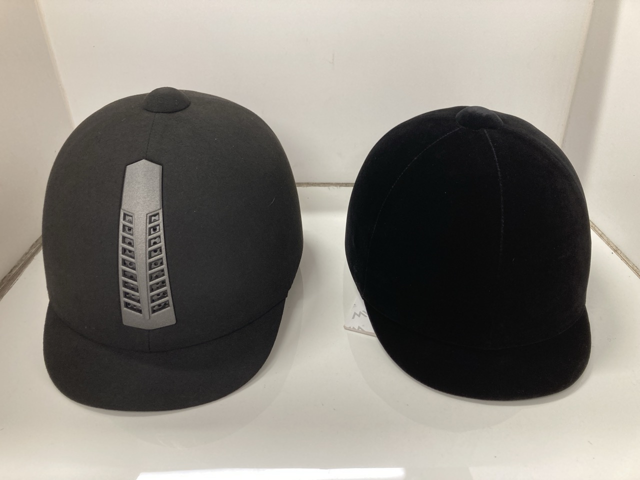 Lot 200  
            Edinburgh SR24 - Delivery Only 

                
RHINEGOLD RIDING HAT BLACK SIZE 7 & MVM EQUESTRIAN HAT BLACK SIZE VG1: LOCATION -...