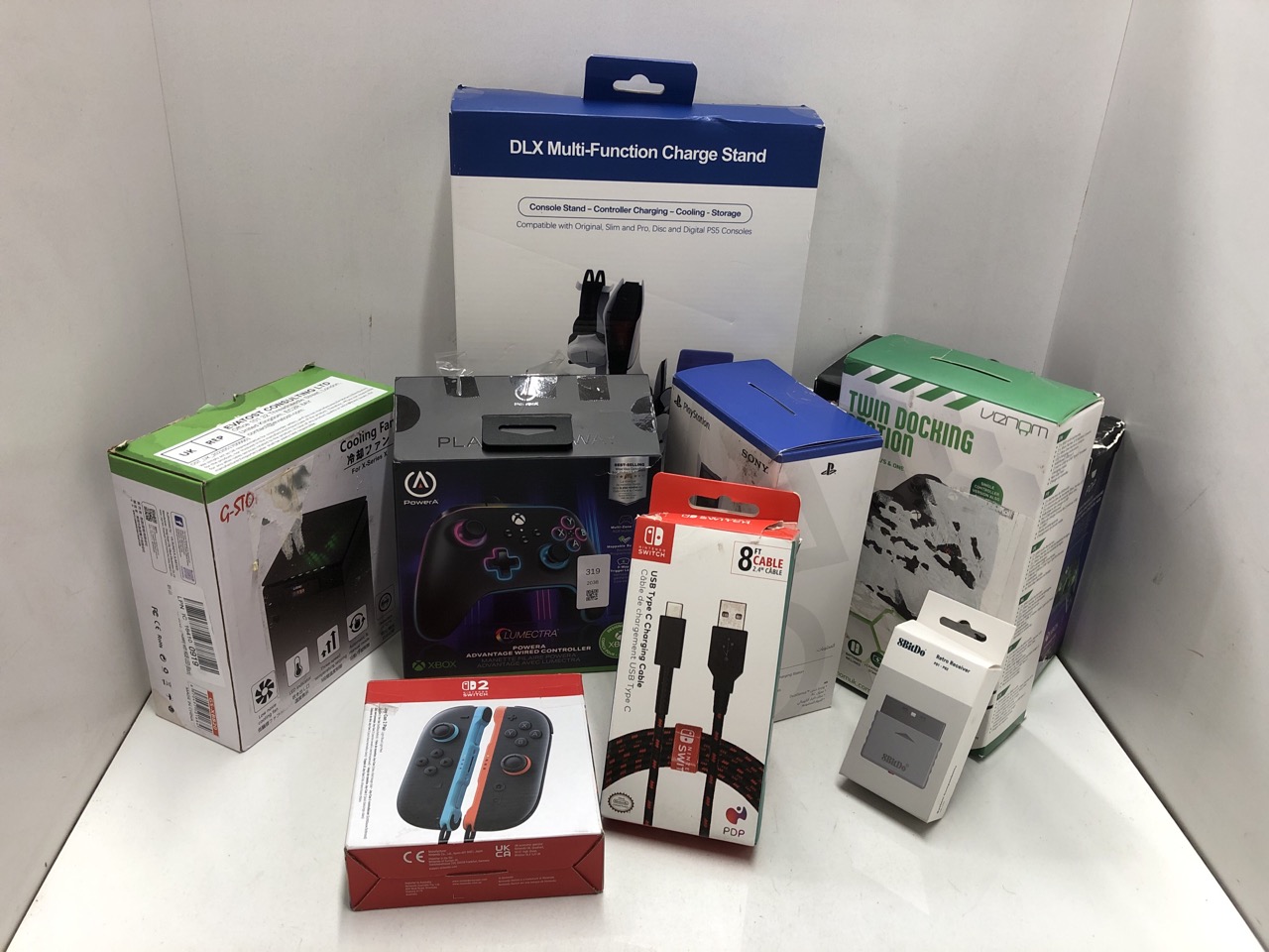 Lot 319  
            Edinburgh SR24 - Delivery Only 

                
QUANTITY OF TECH & GAMING ITEMS TO INCLUDE 8BITDO RETRO RECEIVER FOR PS1, PS2 & W...