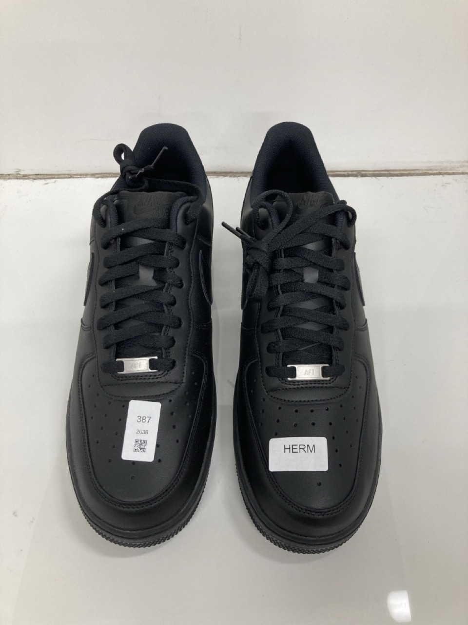 Lot 387  
            Edinburgh SR24 - Delivery Only 

                
BLACK NIKE AIR FORCES 1S UK 12: LOCATION - F RACK - Image 3