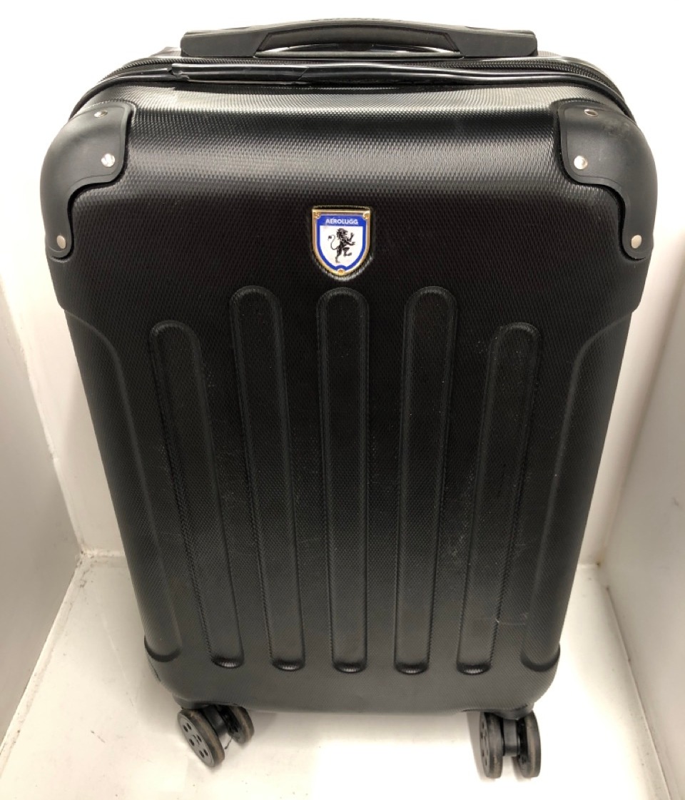 Lot 513  
            Edinburgh SR24 - Delivery Only 

                
AEROLUGG BLACK SMALL HARDSHELL SUITCASE: LOCATION - BACK RACK