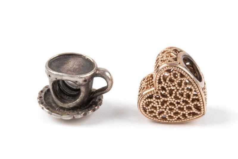 Lot 139  
            Nottingham Luxury Room - Delivery Only 

                
Pandora Silver and Rose Gold Plated Silver Selection of Two Charms, 4.9g (VAT Onl...