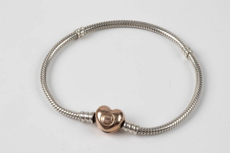Lot 145  
            Nottingham Luxury Room - Delivery Only 

                
Pandora Silver Charm Bracelet with Rose Gold Plated Silver Heart Clasp, 18cm, 14....