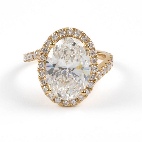 Lot 15  
            Nottingham Luxury Room - Delivery Only 

                
18K Yellow 5.01ct Laboratory Grown Oval Brilliant-cut Diamond with Halo and Shoul...