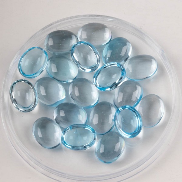 Lot 186  
            Nottingham Luxury Room - Delivery Only 

                
40.57ct Sky Blue Topaz Cabochon Oval-cut Parcel of Gemstones, 9x7mm