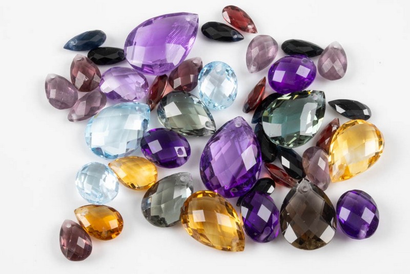 Lot 205  
            Nottingham Luxury Room - Delivery Only 

                
100.70ct Amethyst, Citrine, Garnet, Sky Blue Topaz, Tourmaline, Sapphire Faceted ...