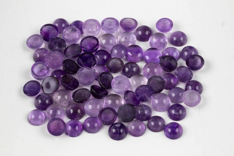 Lot 210  
            Nottingham Luxury Room - Delivery Only 

                
91.07ct African Amethyst Cabochon Round-cut Parcel of Gemstones, 7mm