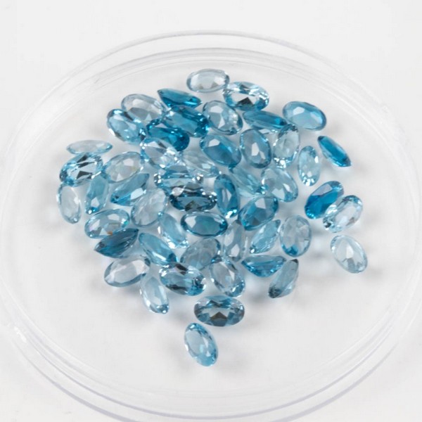 Lot 213  
            Nottingham Luxury Room - Delivery Only 

                
13.67ct Blue Topaz - London Faceted Oval-cut Parcel of Gemstones, 5x3mm