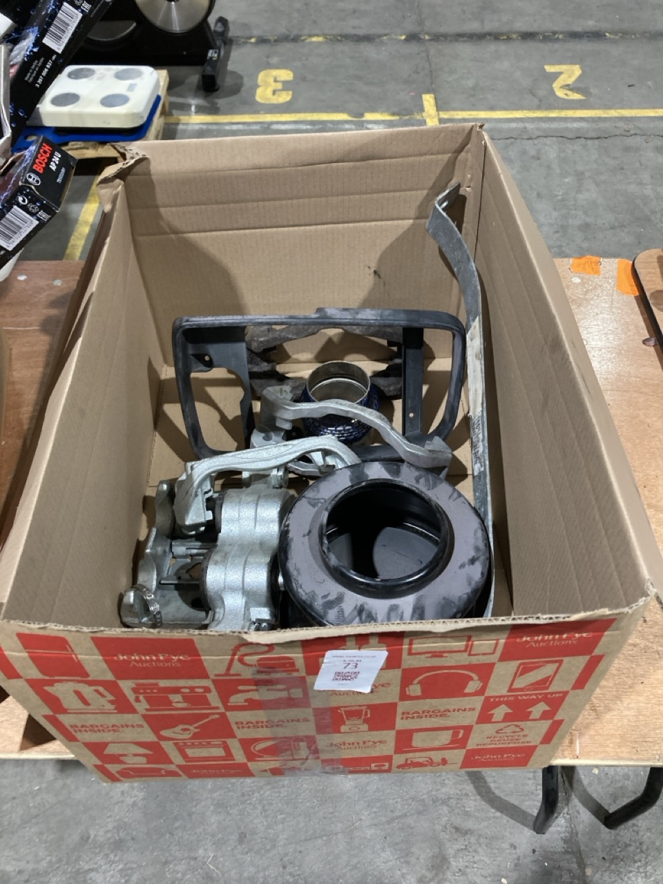 Lot 73  
            Birmingham - Collection Only 

                
ASSORTMENT OF PARTS TO INCLUDE A BRAKE CALIPER