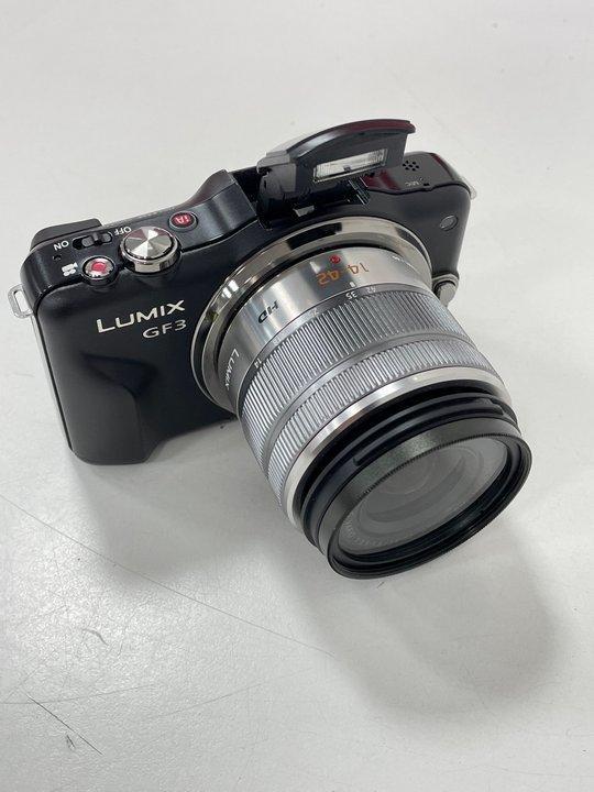 Lot 64  
            Marchington - Parcel Delivery Only 

                
PANASONIC LUMIX DMC-GF3 MEGAPIXELS MIRRORLESS CAMERA. WITH LUMIX G VARIO 14-42MM ...