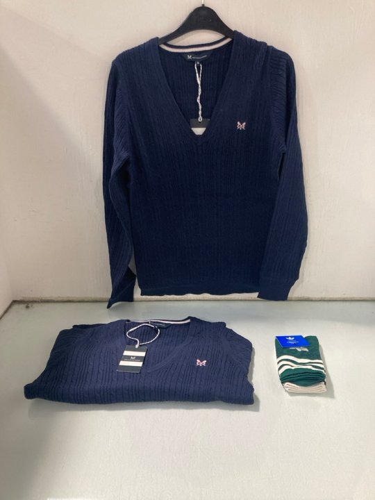 Lot 169  
            Marchington SR13 - Parcel Delivery Only 

                
2 X CREW COMPANY LADIES COTTON CABLE V-NECK JUMPERS IN NAVY-UK SIZE 12 TO INCLUDE...
