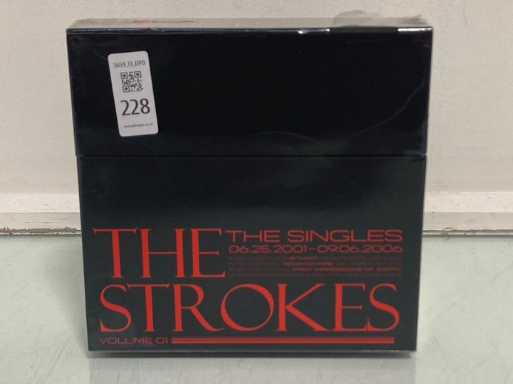 Lot 228  
            Marchington SR13 - Parcel Delivery Only 

                
THE STROKES THE SINGLES FROM 2001 TO 2006 COLLECTION OF FIRST TEN SINGLES (SEALED...