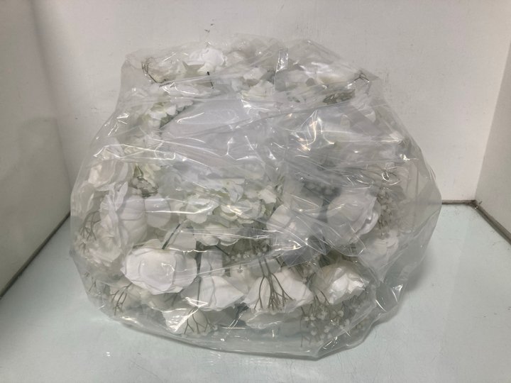 Lot 378  
            Marchington SR13 - Parcel Delivery Only 

                
ARTIFICIAL FLOWER TABLE CENTERPIECE IN WHITE: LOCATION - H8