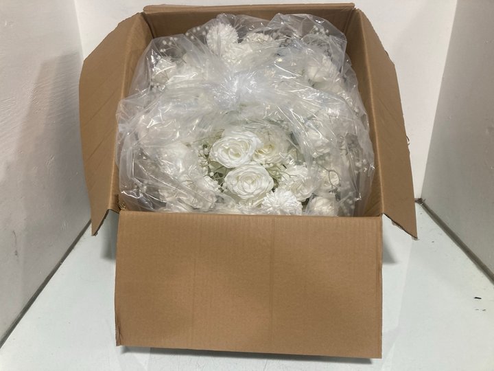 Lot 385  
            Marchington SR13 - Parcel Delivery Only 

                
ARTIFICIAL FLOWER TABLE CENTERPIECE IN WHITE: LOCATION - H8