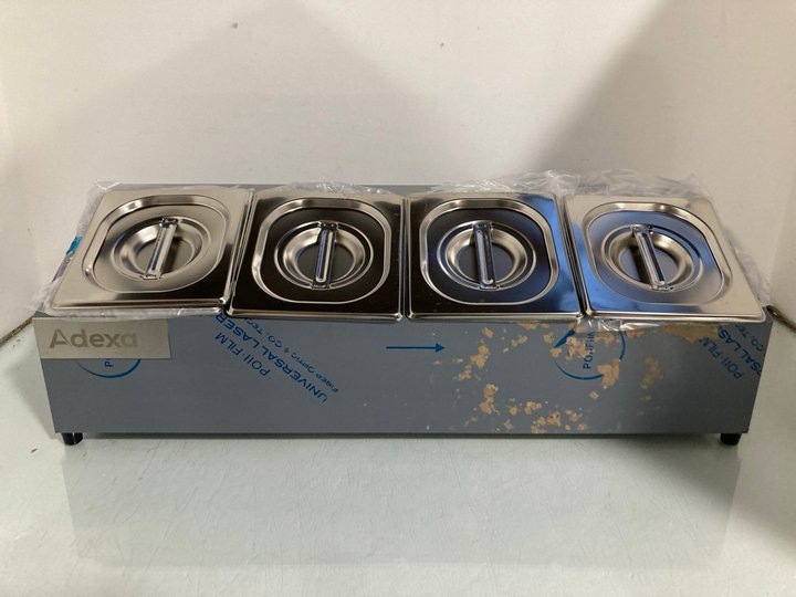 Lot 451  
            Marchington SR13 - Parcel Delivery Only 

                
ADEXA FOUR GRID CONDIMENT HOLDER: LOCATION - H4