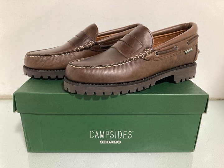 Lot 455  
            Marchington SR13 - Parcel Delivery Only 

                
MENS CAMPSIDES SEBAGO ACADIA MOCASSIN IN TOTAL DARK BROWN - UK SIZE: 10 - ORIGINA...