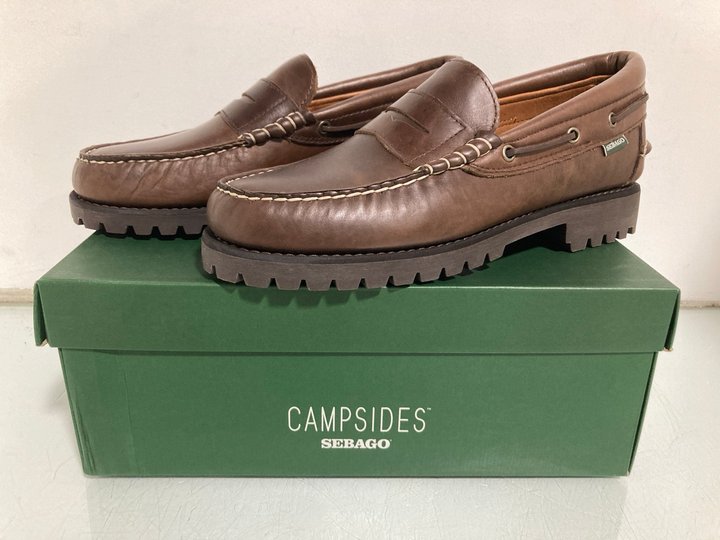 Lot 458  
            Marchington SR13 - Parcel Delivery Only 

                
MENS CAMPSIDES SEBAGO ACADIA MOCASSIN IN TOTAL DARK BROWN - UK SIZE: 7 - ORIGINAL...