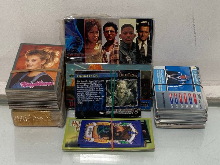 Lot 521  
            Marchington SR13 - Parcel Delivery Only 

                
A COLLECTION OF VINTAGE COLLECTOR'S CARDS TO INCLUDE NEIGHBOURS, HARRY POTTER, JA...