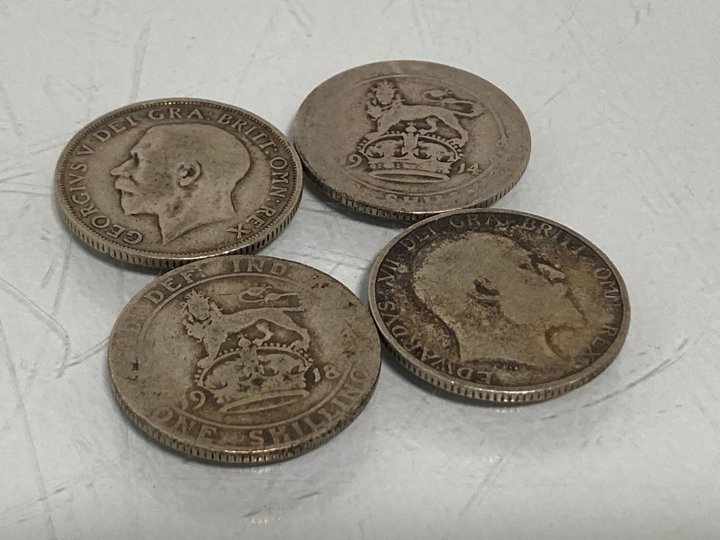 Lot 565  
            Marchington SR13 - Parcel Delivery Only 

                
4 X GEORGE V SILVER SHILLINGS: LOCATION - H1