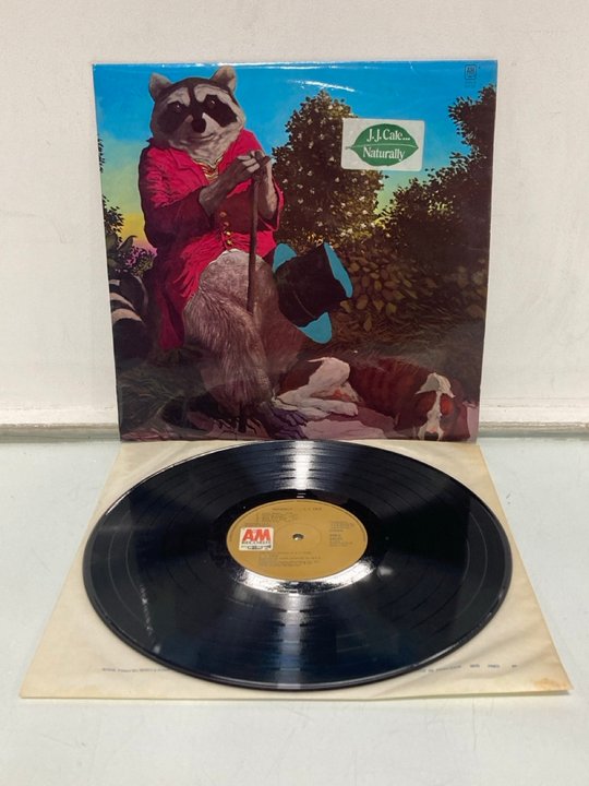 Lot 572  
            Marchington SR13 - Parcel Delivery Only 

                
ORIGINAL VINYL LP, JJ CALE "NATURALLY" AM RECORDS AMLS68105 EXCELLENT CONDITION: ...