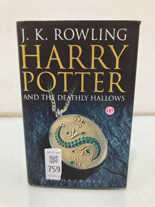 Lot 759  
            Marchington SR13 - Parcel Delivery Only 

                
A J.K. ROWLING FIRST EDITION HARDBACK BOOK WITH DUSTWRAPPER, "HARRY POTTER AND TH...