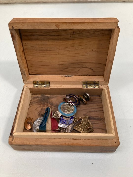 Lot 777  
            Marchington SR13 - Parcel Delivery Only 

                
AN ANTIQUE OLIVE WOOD BOX CARVED WITH THE WORD 'JERUSALEM' AND CONTAINING ANTIQUE...