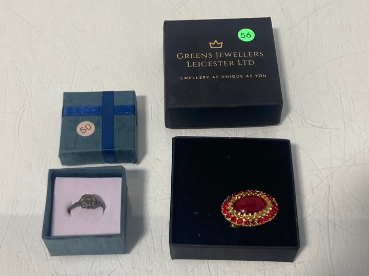 Lot 897  
            Marchington SR13 - Parcel Delivery Only 

                
A GOLD COLOURED BROOCH SET WITH CLEAR AND RED STONES, WITH BOX TO ALSO INCLUDE A ...