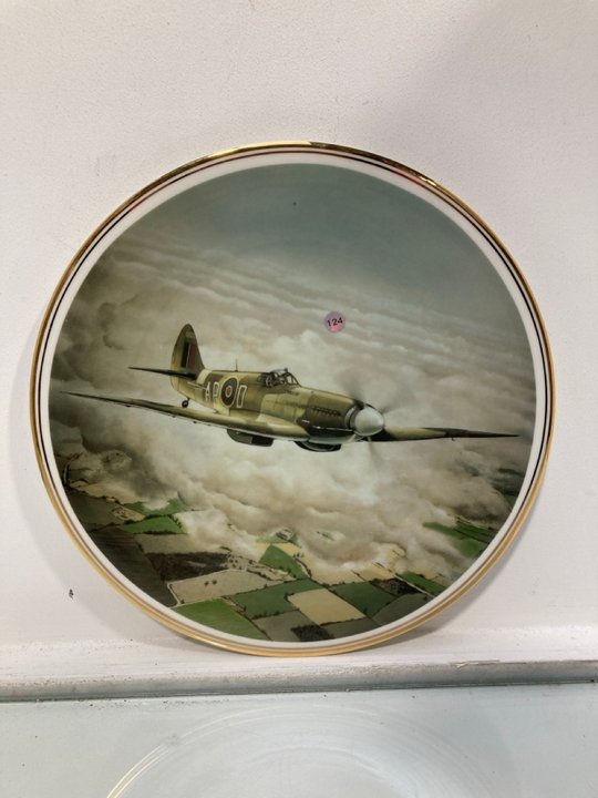 Lot 930  
            Marchington SR13 - Parcel Delivery Only 

                
A FENTON BONE CHINE COLLECTOR'S SPITFIRE PLATE: LOCATION - F17