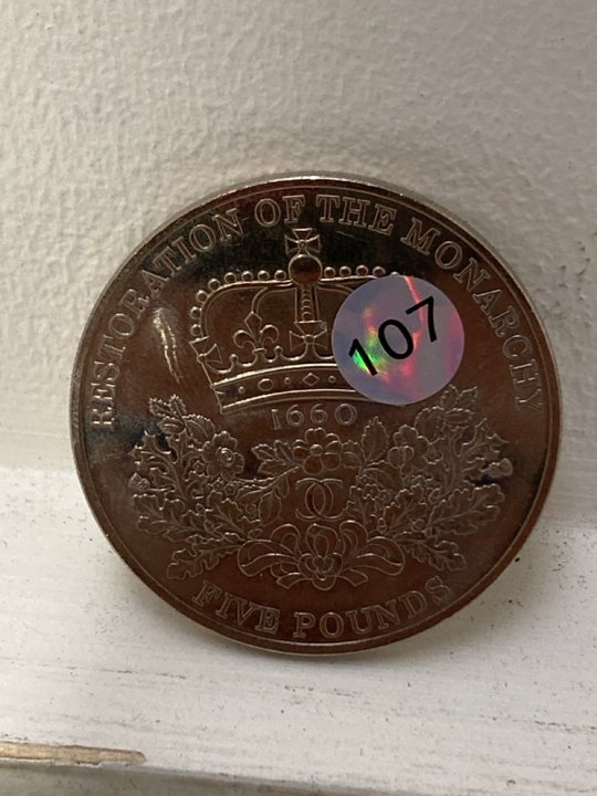 Lot 937  
            Marchington SR13 - Parcel Delivery Only 

                
2010 350TH ANNIVERSARY OF THE RESTORATION OF THE MONARCHY COMMEMORATIVE FIVE POUN...