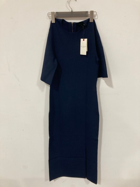 Lot 1177  
            Marchington SR10 - Parcel Delivery Only 

                
TED BAKER BODYCON KNIT DRESS IN NAVY - SIZE US 3 ORIGINAL RRP £179: LOCATION - DR13
